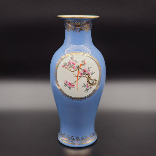 A Mirrored Pair of Chinese Famille Rose Lavender Blue-Ground 'Medallion' Vases, Republic Period Mollaris.com