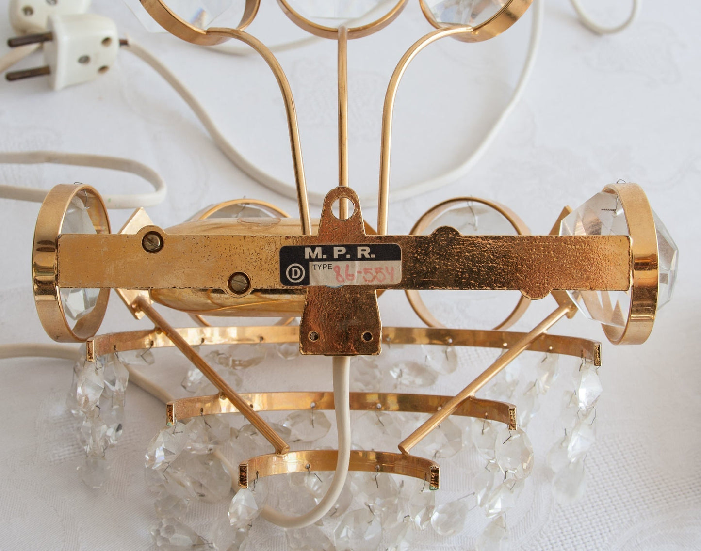 A Pair of Gold-Plated Brass Wall Sconces with Cut Crystal Prisms Mollaris.com