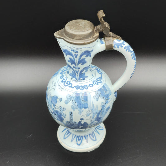 DUTCH DELFT BLUE AND WHITE CHINOISERIE FOOTED JUG WITH PEWTER LID | LATE 17TH CENTURY Mollaris.com