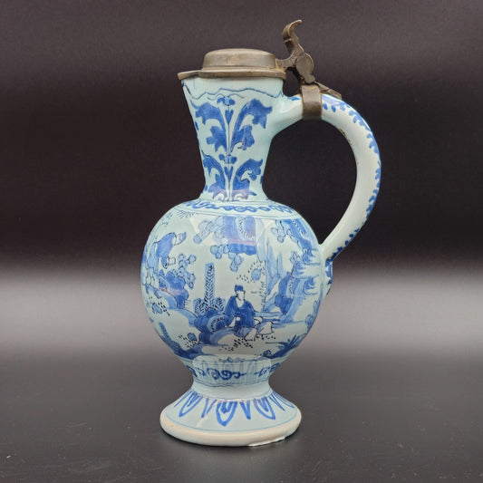DUTCH DELFT BLUE AND WHITE CHINOISERIE FOOTED JUG WITH PEWTER LID | LATE 17TH CENTURY Mollaris.com