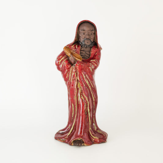 A CHINESE SHIWAN WARE SANG-DE-BOEUF STONEWARE FIGURE OF A LUOHAN | 19TH CENTURY