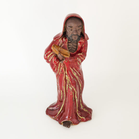 A CHINESE SHIWAN WARE SANG-DE-BOEUF STONEWARE FIGURE OF A LUOHAN | 19TH CENTURY