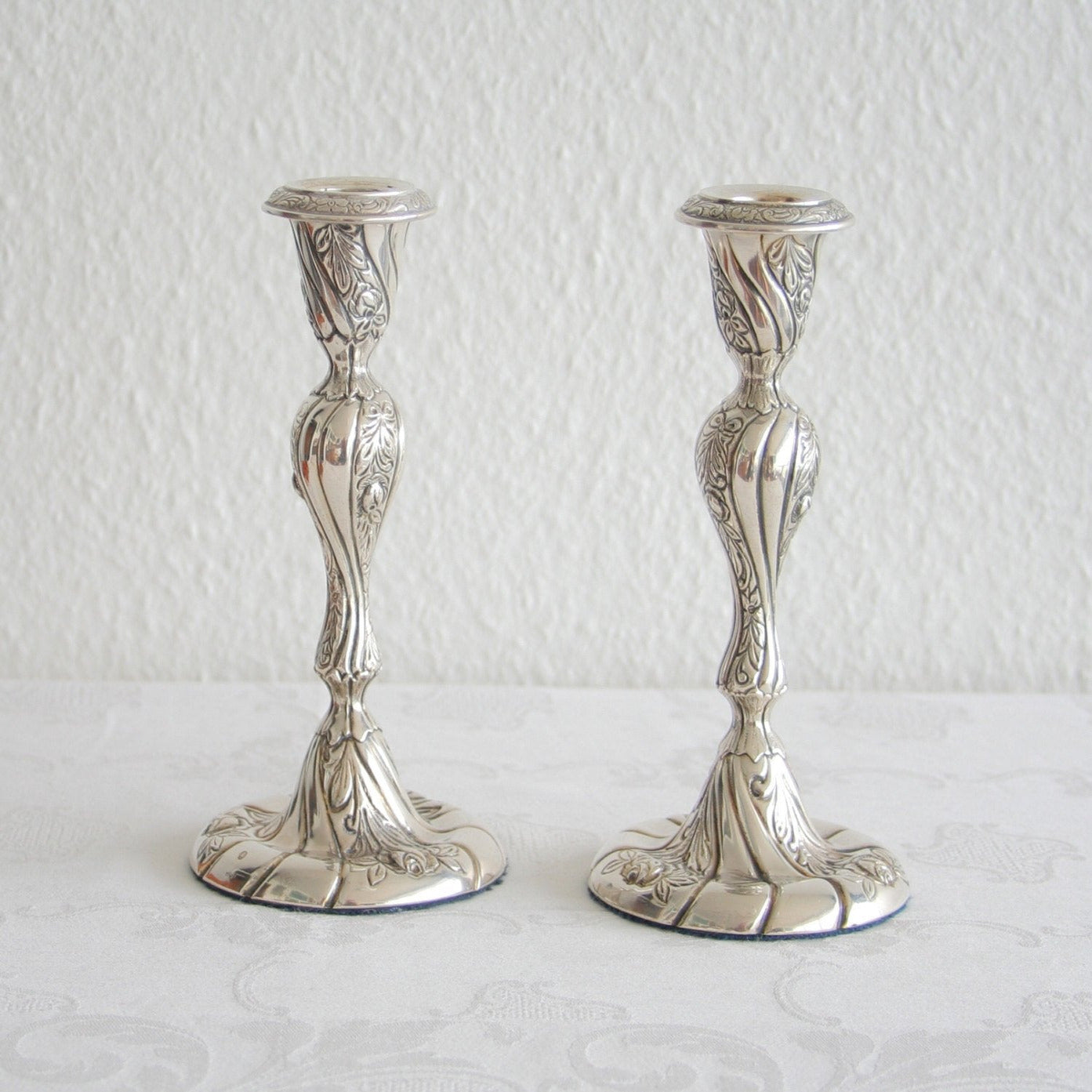 A pair of HUGO GRÜN Romantic Rococo Style Roses Flowers Leaves Solid Silver (830S) Candlesticks Mollaris.com