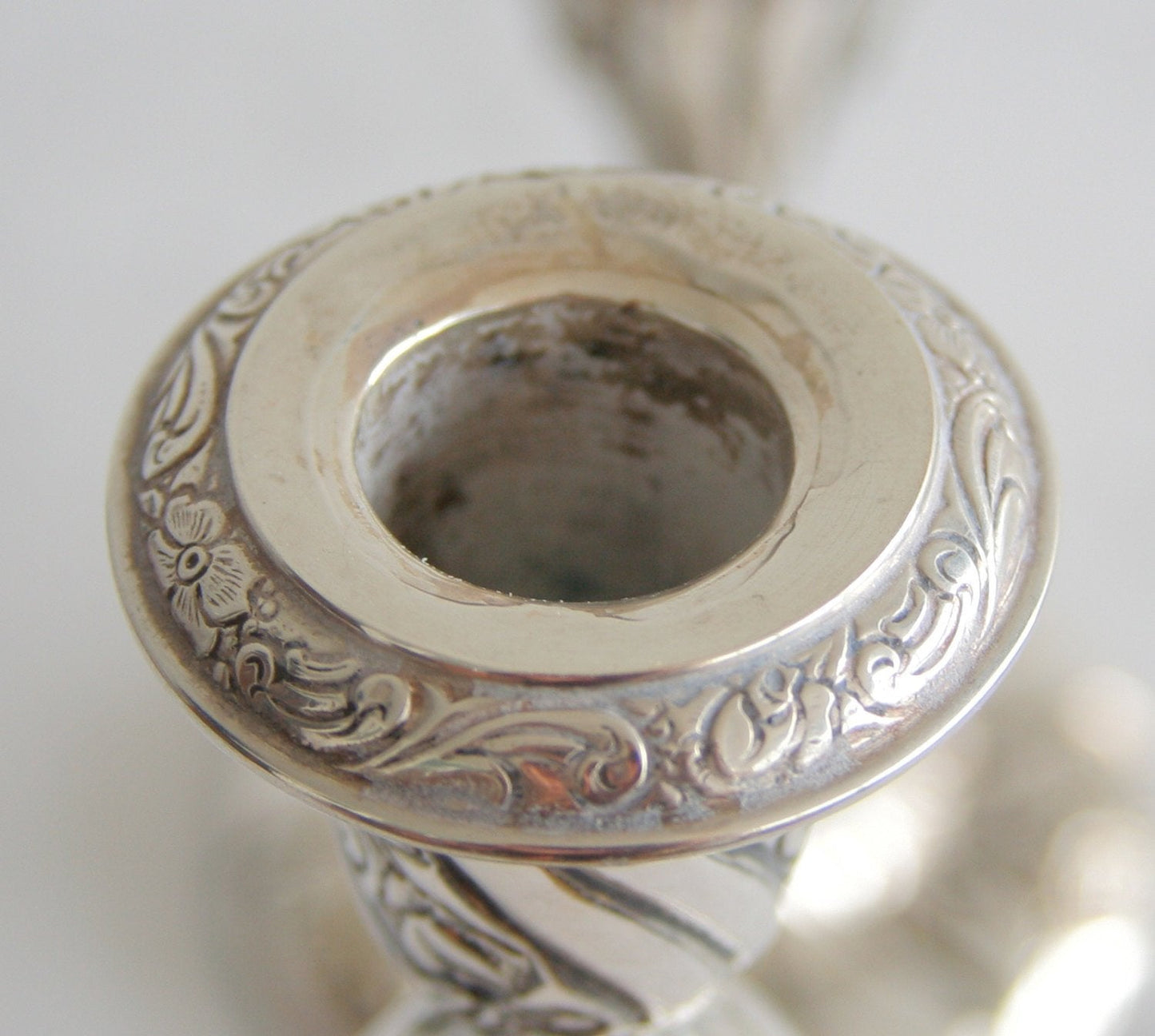 A pair of HUGO GRÜN Romantic Rococo Style Roses Flowers Leaves Solid Silver (830S) Candlesticks Mollaris.com