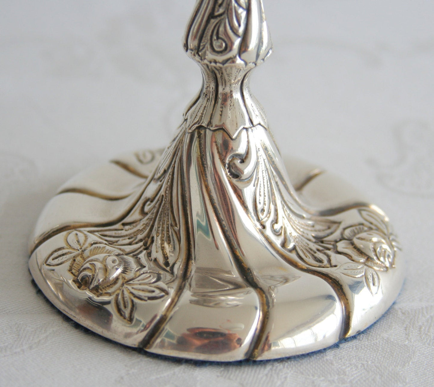 A pair of HUGO GRÜN Romantic Rococo Style Roses Flowers Leaves Solid Silver (830S) Candlesticks Mollaris.com