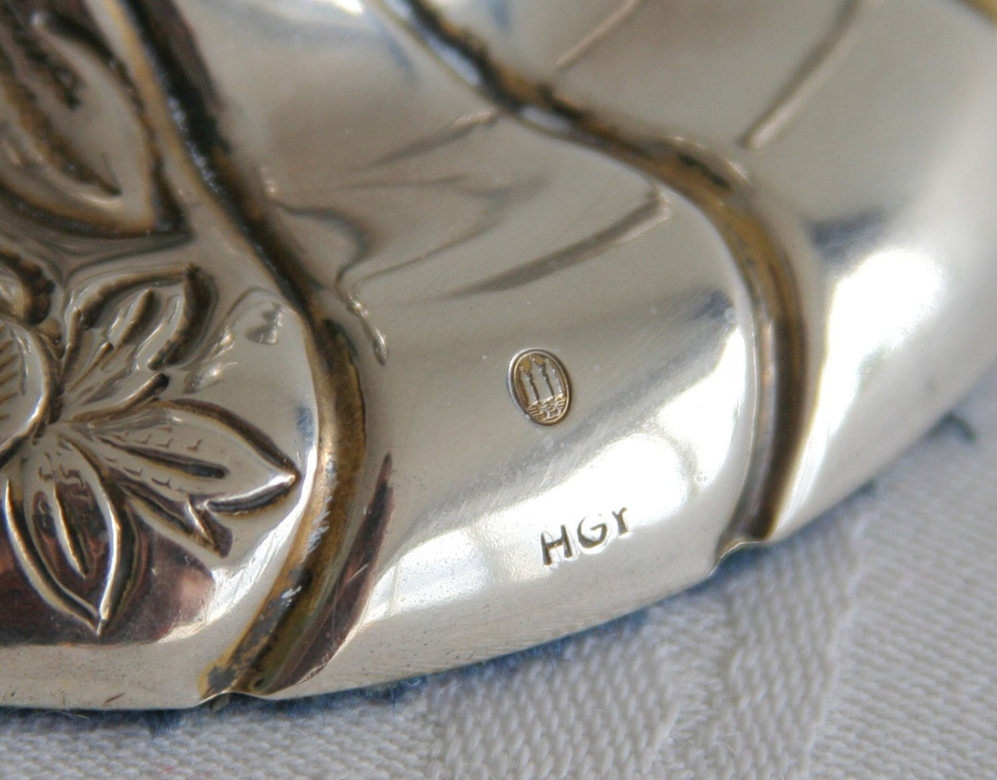A pair of HUGO GRÜN Romantic Rococo Style Roses Flowers Leaves Solid Silver (830S) Candlesticks Mollaris.com