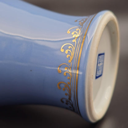 A Mirrored Pair of Chinese Famille Rose Lavender Blue-Ground 'Medallion' Vases, Republic Period Mollaris.com 
