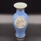 A Mirrored Pair of Chinese Famille Rose Lavender Blue-Ground 'Medallion' Vases, Republic Period Mollaris.com 
