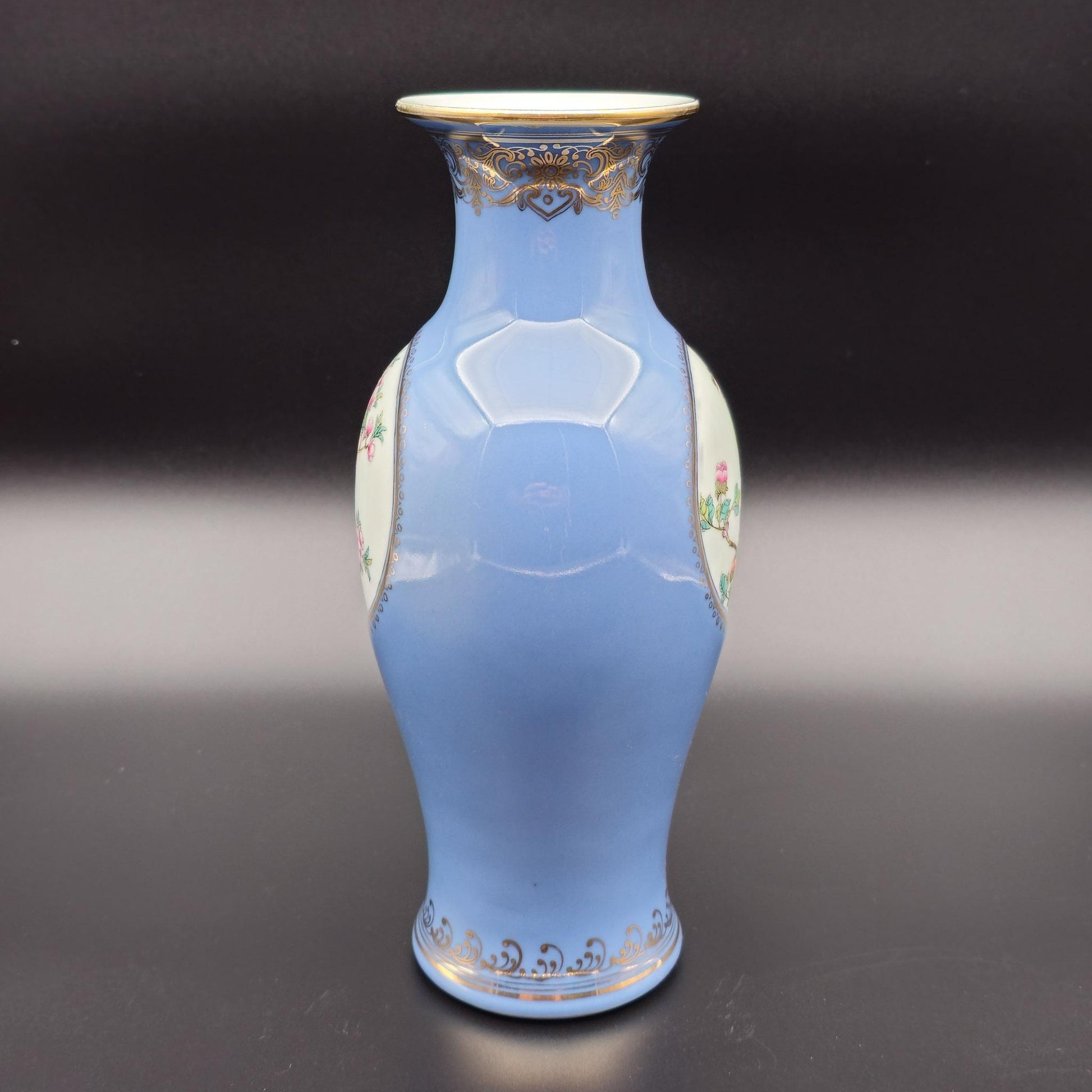 A Mirrored Pair of Chinese Famille Rose Lavender Blue-Ground 'Medallion' Vases, Republic Period Mollaris.com 