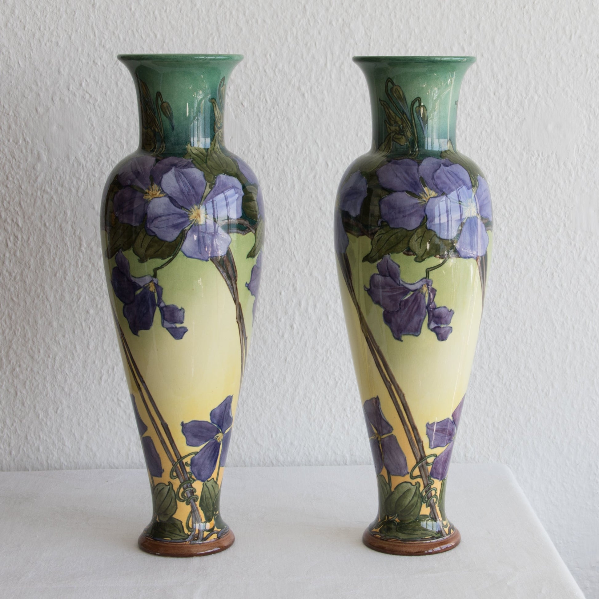 A pair of KATHERINE B. SMALLFIELD Doulton Lambeth Faience Clematis Decorated Large Baluster Vases Mollaris.com 