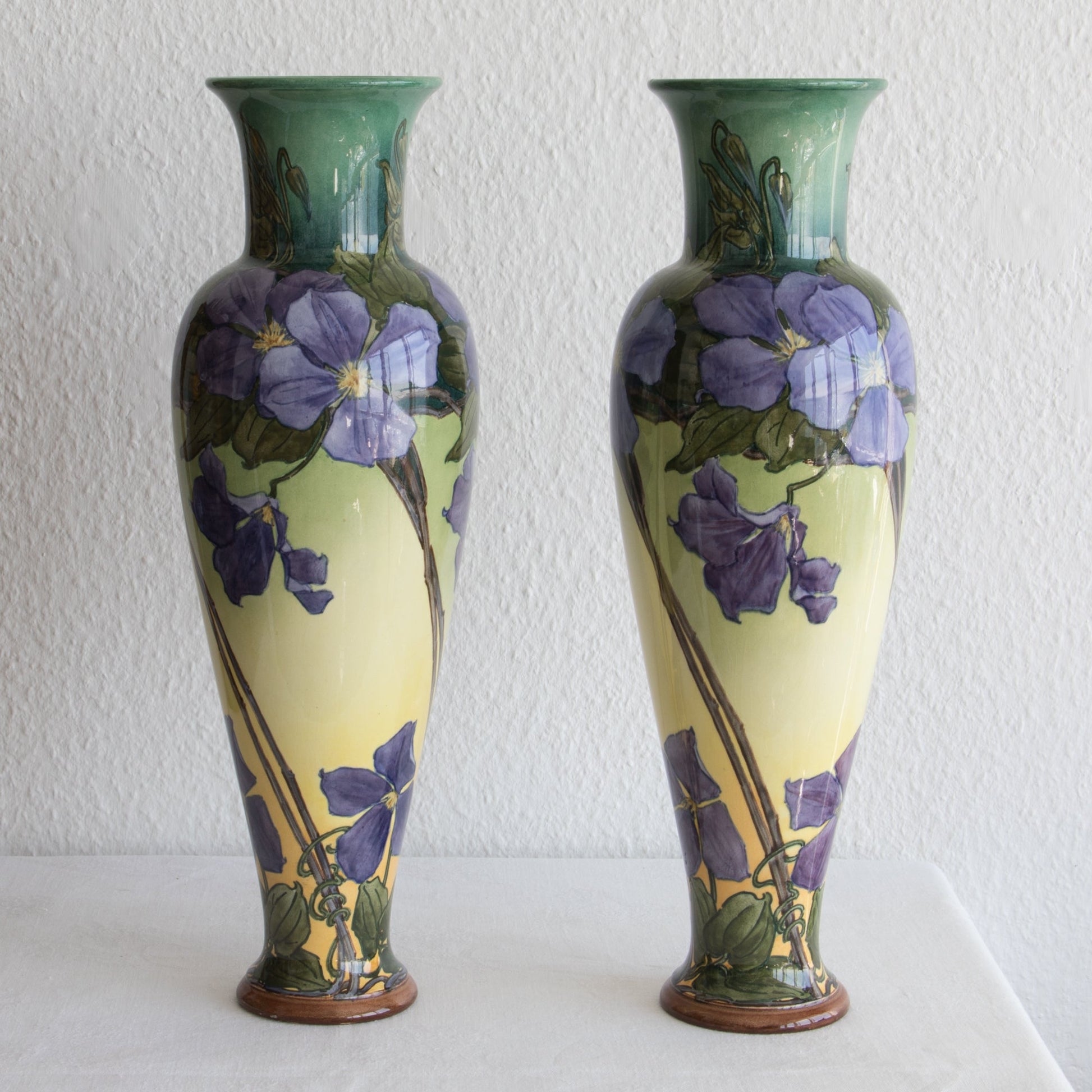 A pair of KATHERINE B. SMALLFIELD Doulton Lambeth Faience Clematis Decorated Large Baluster Vases Mollaris.com 