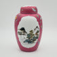 AN EXCEPTIONAL CHINESE FAMILLE ROSE LANDSCAPE INCISED RUBY GROUND LIDDED JAR | LATE REPUBLIC PERIOD, MID 20TH CENTURY