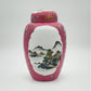 AN EXCEPTIONAL CHINESE FAMILLE ROSE LANDSCAPE INCISED RUBY GROUND LIDDED JAR | LATE REPUBLIC PERIOD, MID 20TH CENTURY