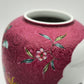 AN EXCEPTIONAL CHINESE FAMILLE ROSE LANDSCAPE INCISED RUBY GROUND LIDDED JAR | LATE REPUBLIC PERIOD, MID 20TH CENTURY