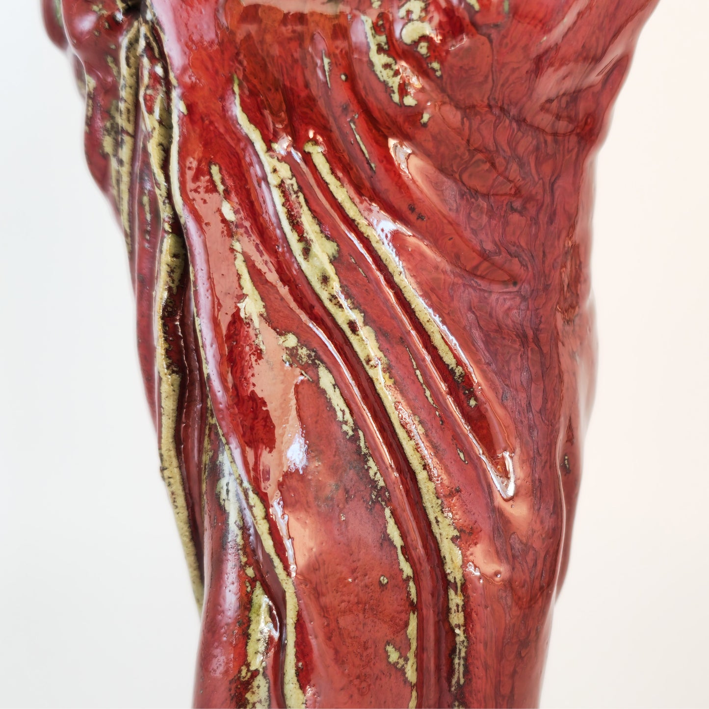 A CHINESE SHIWAN WARE SANG-DE-BOEUF STONEWARE FIGURE OF A LUOHAN | 19TH CENTURY