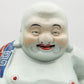 A CHINESE FAMILLE ROSE LAUGHING BUDDHA PORCELAIN FIGURE BY MAO JI SHENG | EARLY 20TH CENTURY